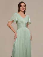 Vestido fruncido de algodón Sea Island con mangas de volante