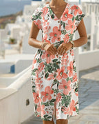 Vestido de estampado floral con escote en V y manga corta
