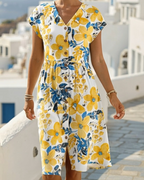 Vestido de estampado floral con escote en V y manga corta