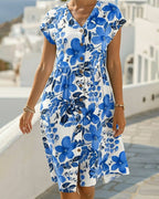 Vestido de estampado floral con escote en V y manga corta