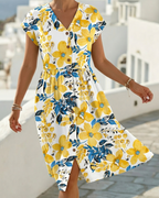Vestido de estampado floral con escote en V y manga corta