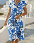 Vestido de estampado floral con escote en V y manga corta