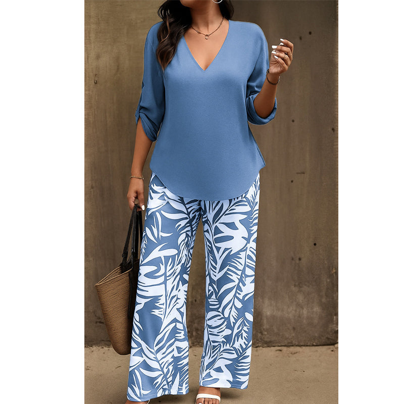 Conjunto femenino elegante: blusa con escote en V y pantalón estampado de pierna ancha