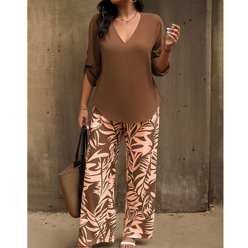 Conjunto femenino elegante: blusa con escote en V y pantalón estampado de pierna ancha