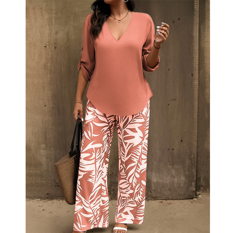 Conjunto femenino elegante: blusa con escote en V y pantalón estampado de pierna ancha